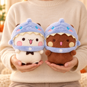 Peluche di circa 18 cm in mano